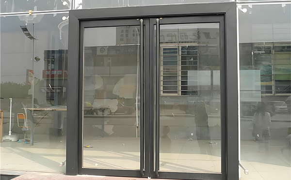 天山玻璃地弹门