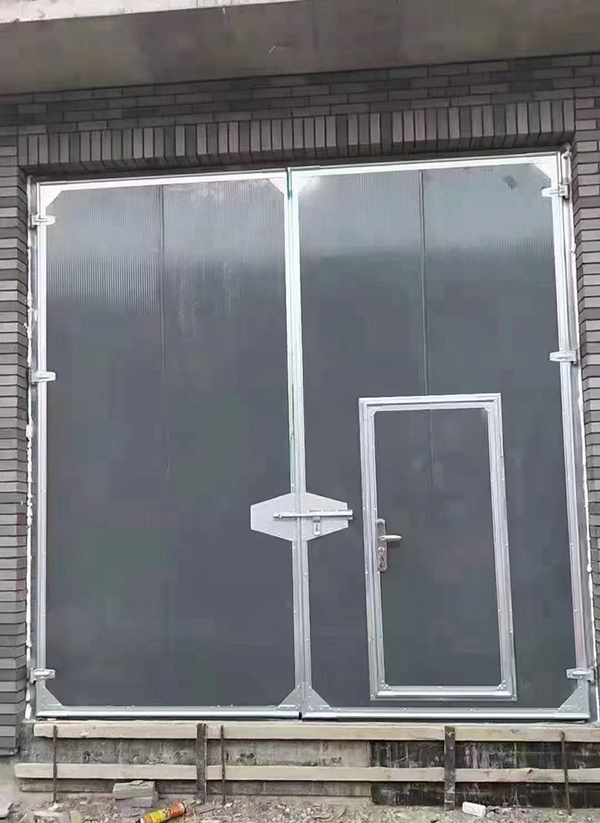 天山工业平开门在大型设备制造车间的应用实例